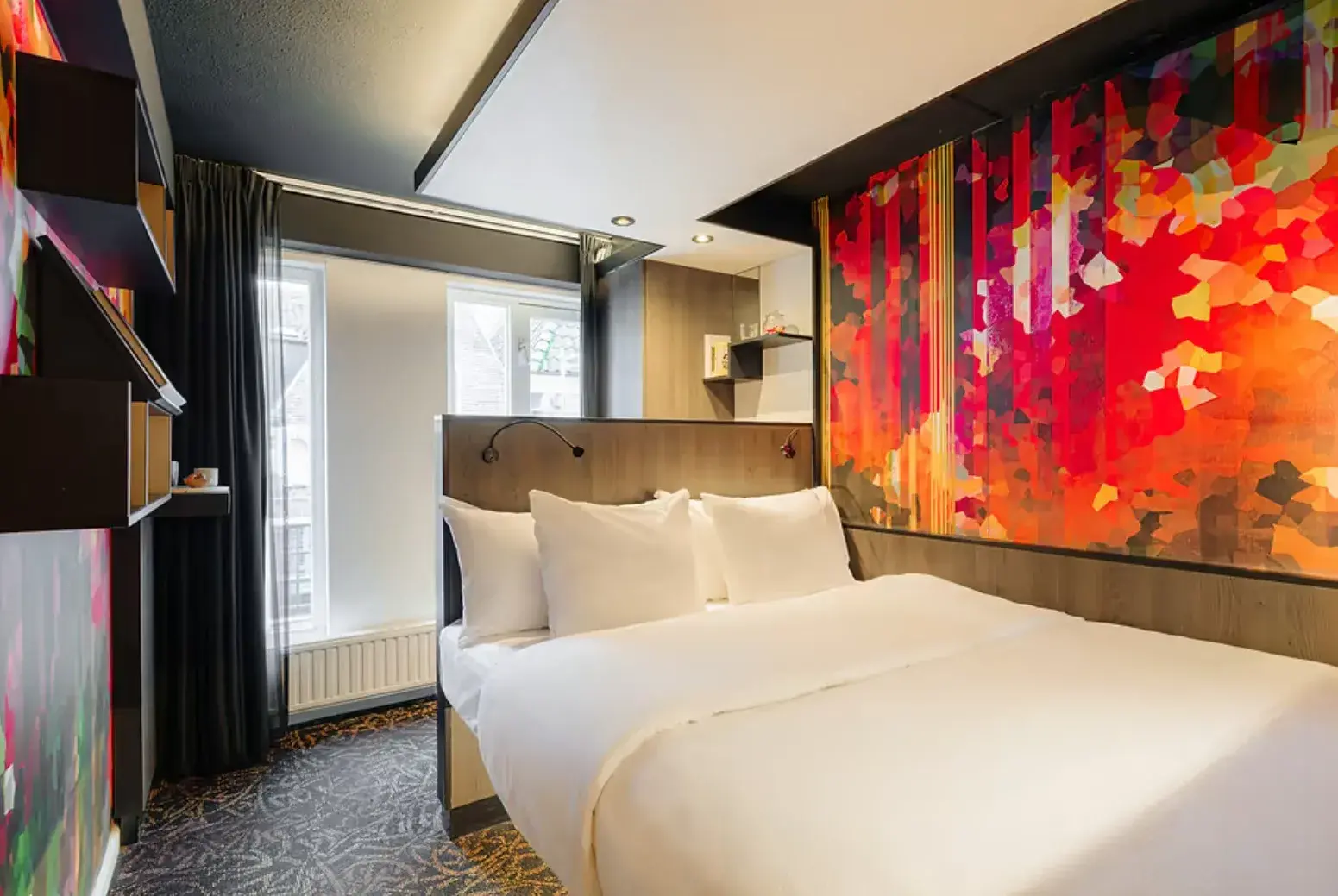 Double room with colourful decor at Eden Hotel Amsterdam